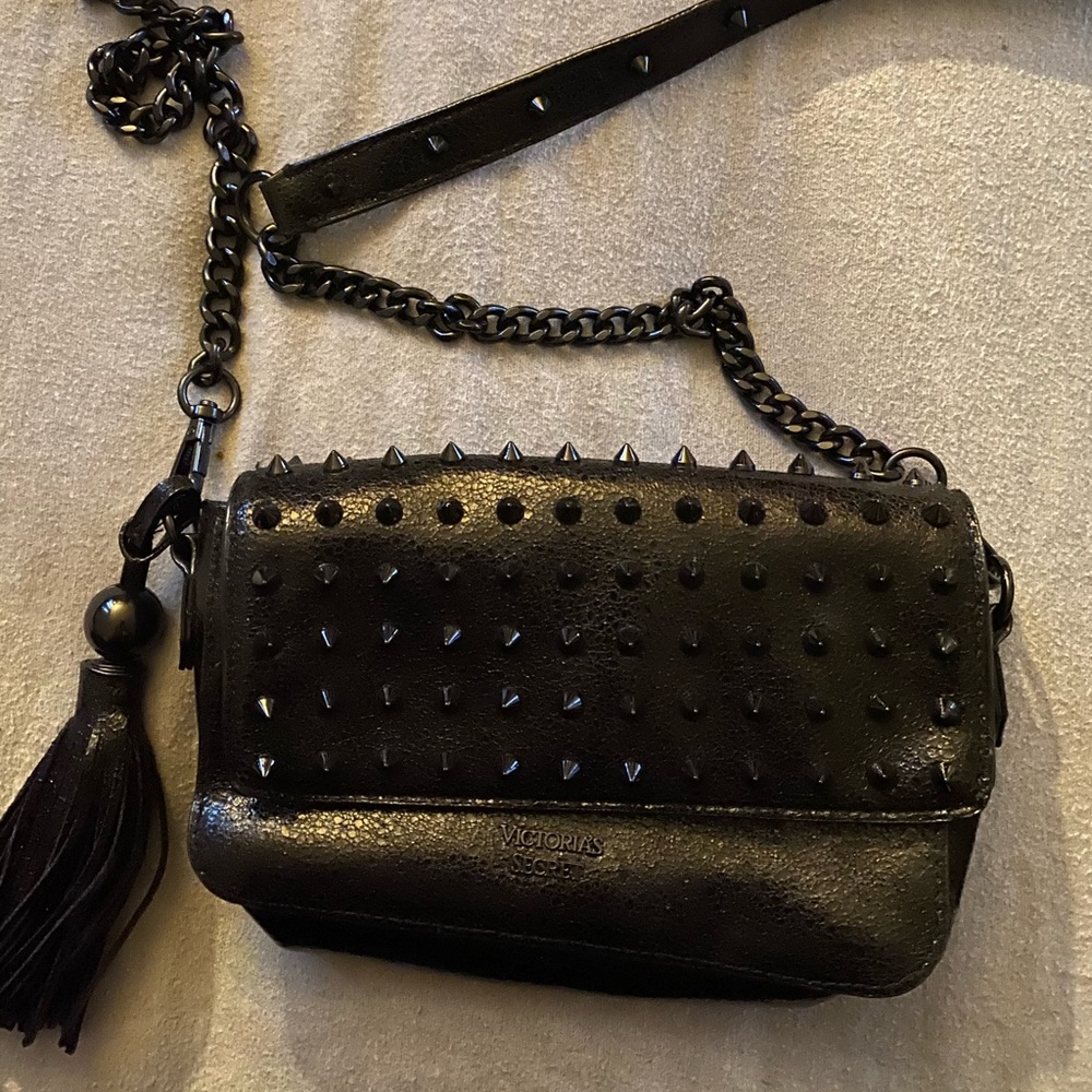Small black spike studded purse